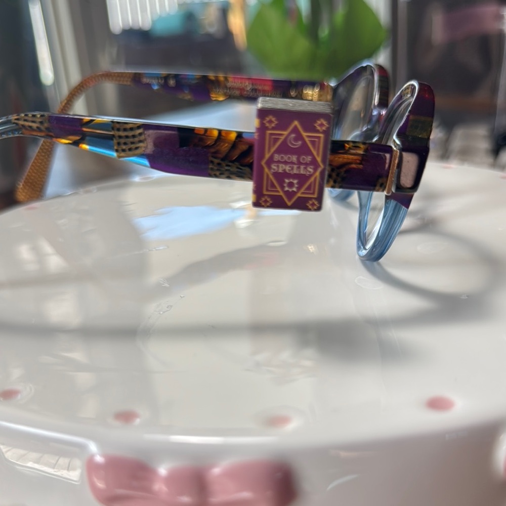 Colorful Book of Spells Glasses Decor.